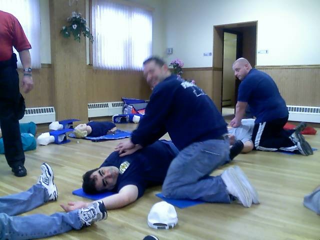 CPR Training - FF Burke practices CPR on Ex-Chief Freeman